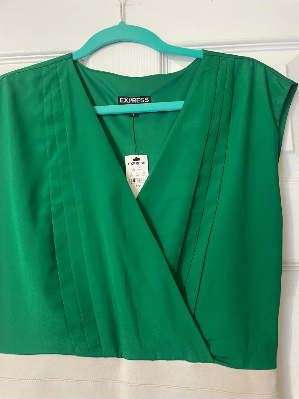 Express Green V-Neck Top with Cream Fitted Mini Skirt